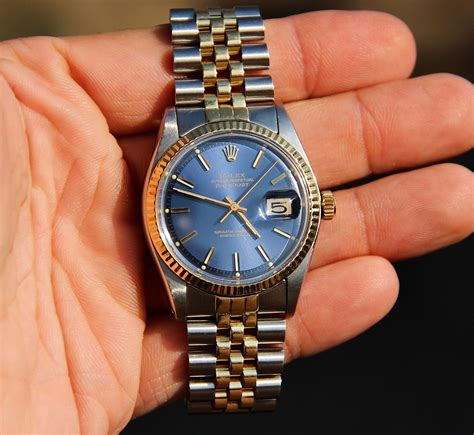 silver blue dial rolex|Rolex watch with blue face.